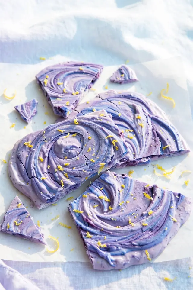 Blueberry lemon frozen yogurt bark with lemon zest